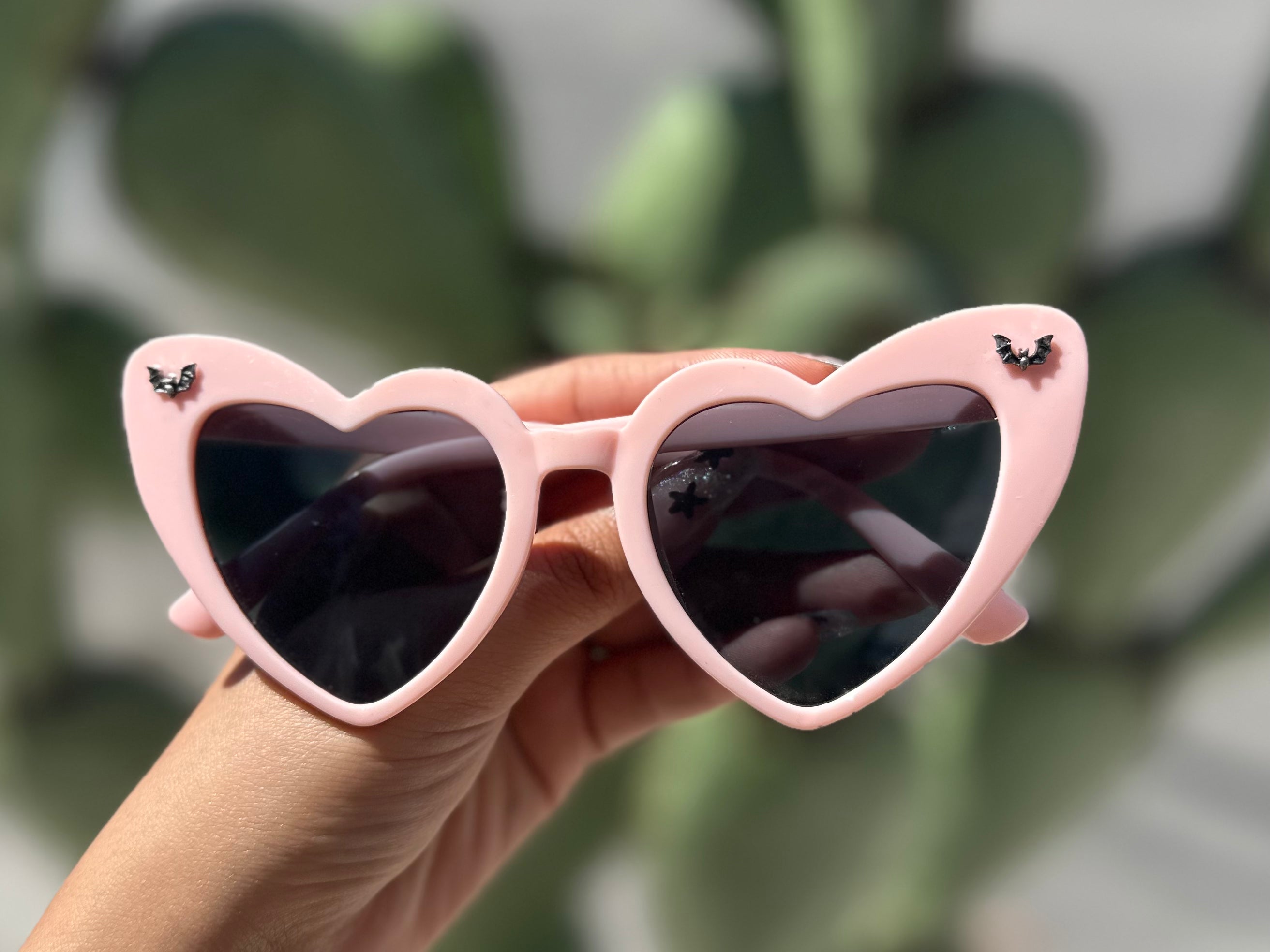 Pink heart sunnies tiny bats.