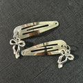 Bow dangle clips