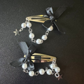 Pearl bow dangle clips