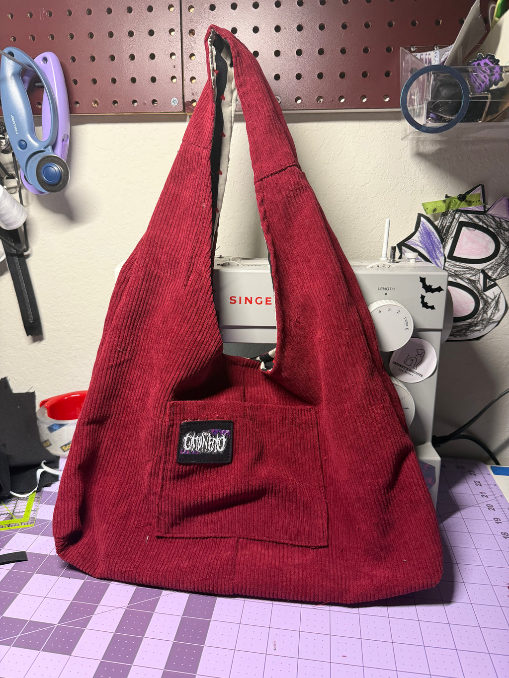 Red corduroy hobo bag